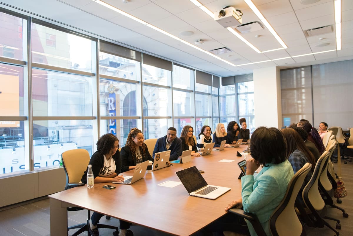 Healthcare professionals gathered around a conference table