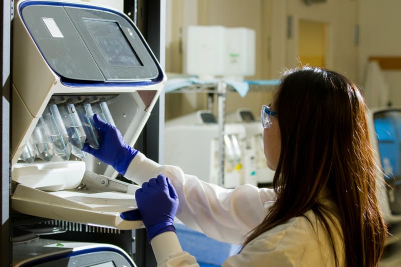 A clinician reviewing product information