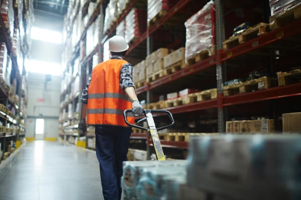 A worker in a distribution warehouse