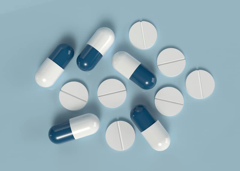 Tablets and capsules on a table