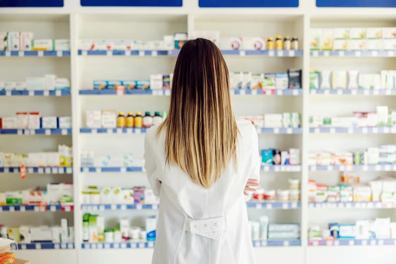 A pharmacist with a patient