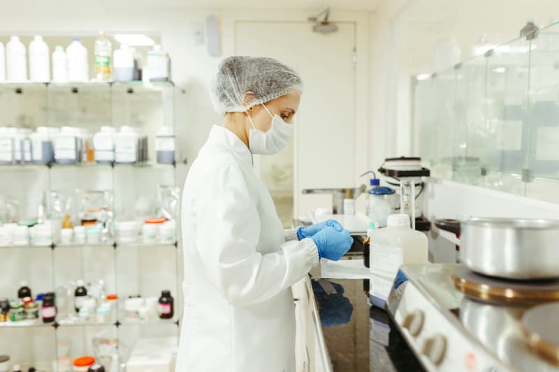 Laboratory staff in protective clothing